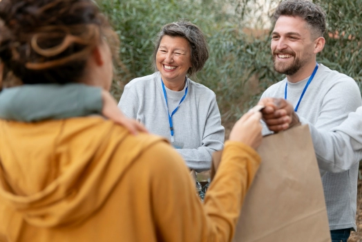 Volunteers donating supplies to others